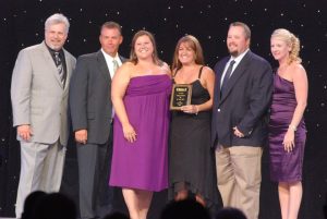 window world kansas city owners receiving award