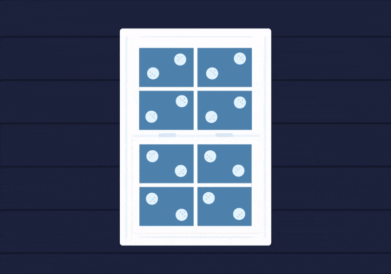 animated gif of round holographic stickers on a window