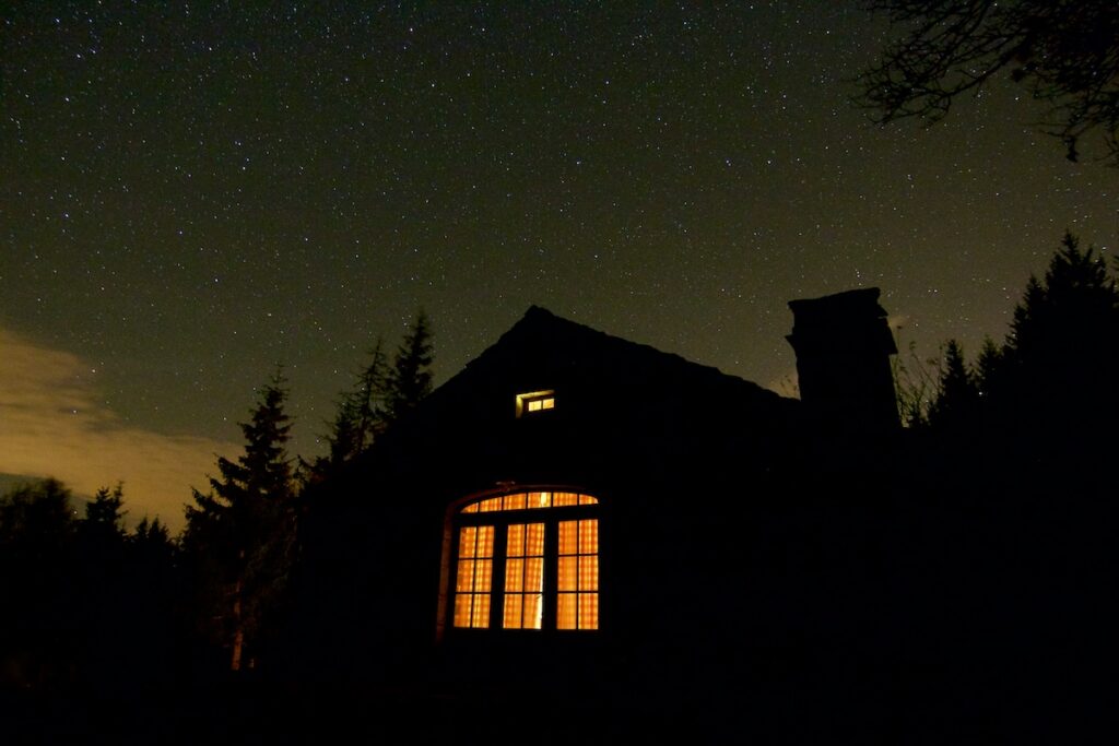 house with custom windows at night